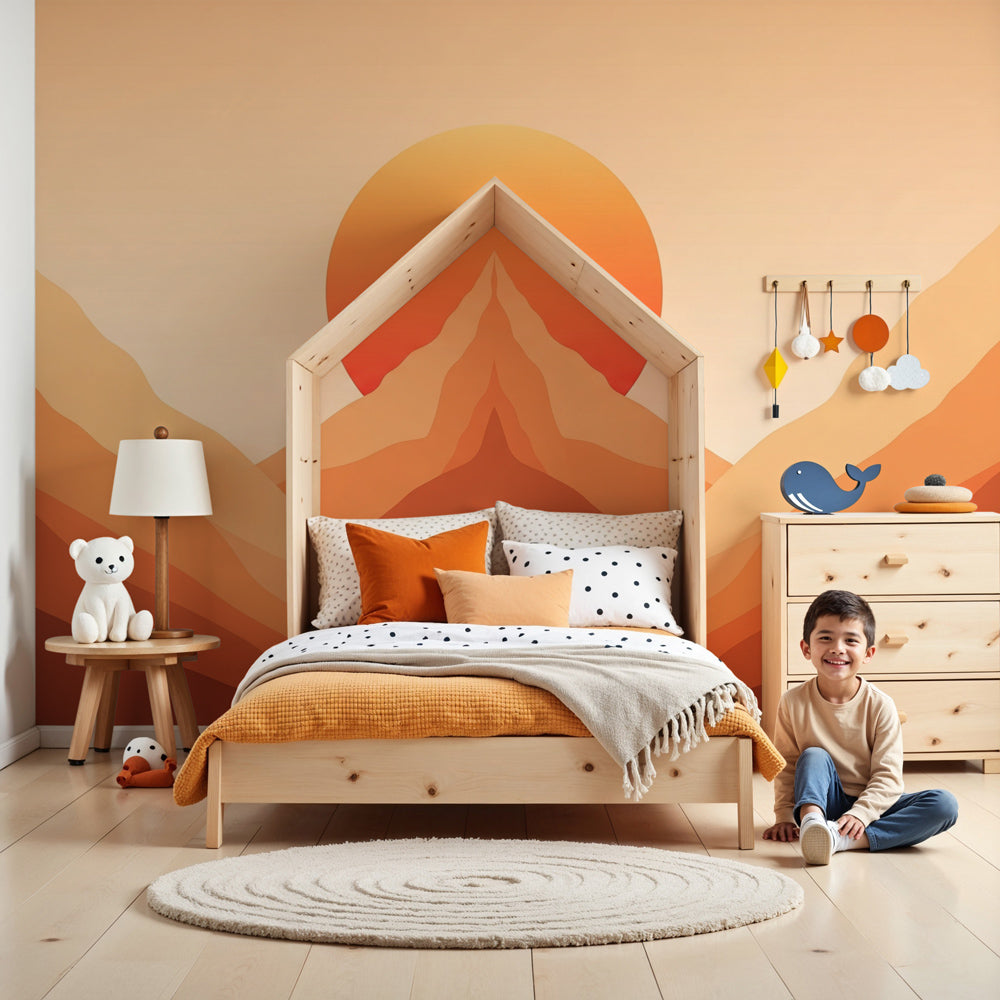 Mountain sunset mural wallpaper creating peaceful nursery atmosphere with orange mountain silhouettes by Kids-Mundo