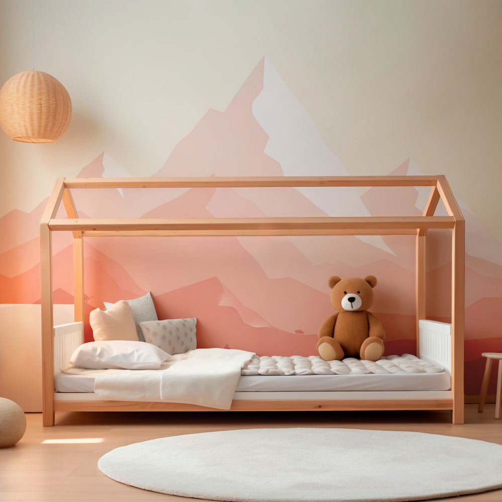 Pink beige mountain animal wallpaper transforming children's bedroom into peaceful nature retreat