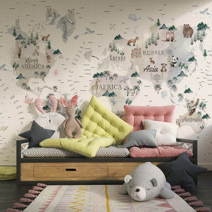 Kids-Mundo watercolour world map wall mural in a playroom, showing labelled continents and gentle wildlife