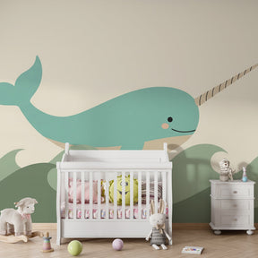 Gentle narwhal mural wallpaper with soft blue waves for calming baby room decor