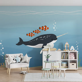 Ocean themed mural wallpaper creating serene underwater atmosphere in baby bedroom