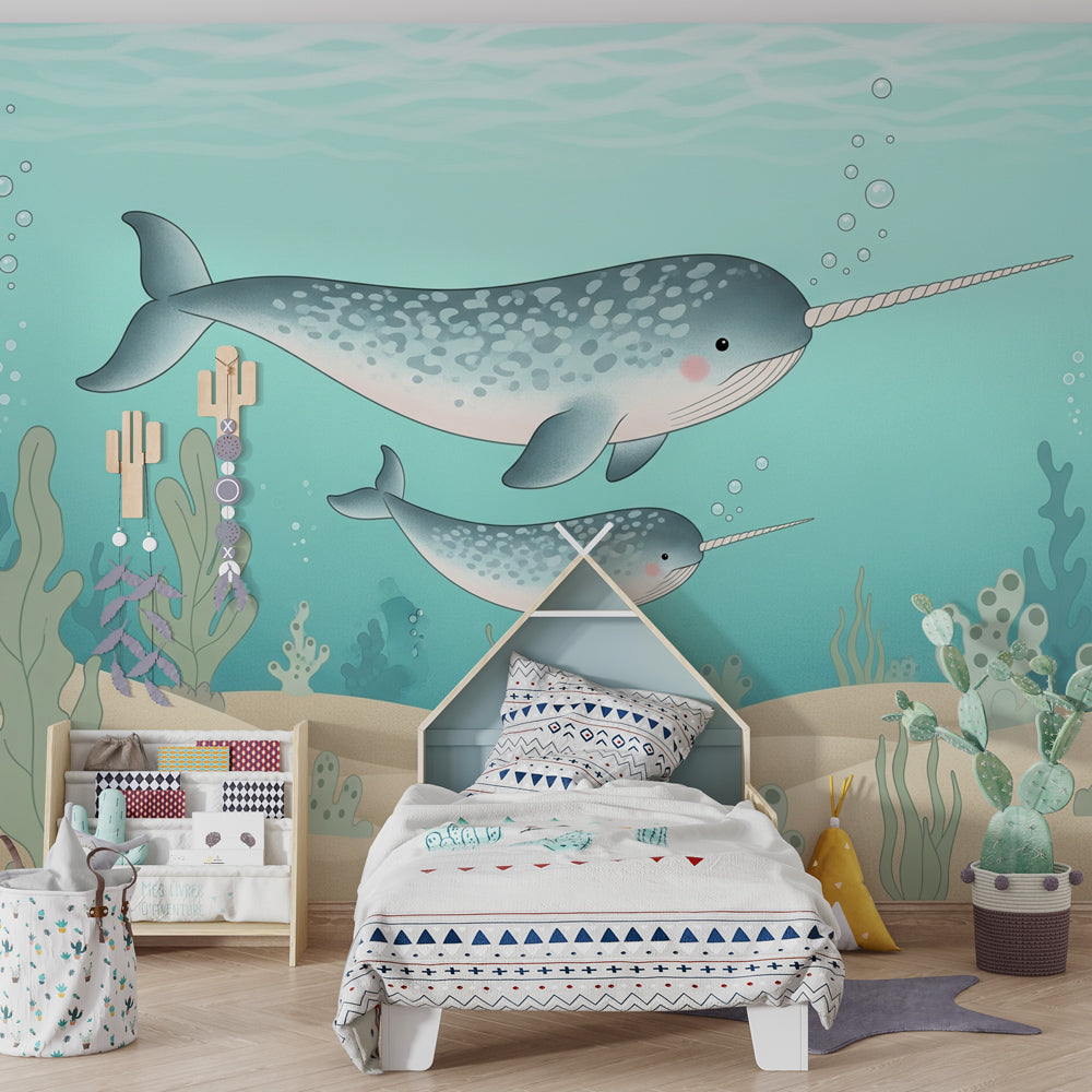 Colorful narwhal wallpaper creating magical underwater atmosphere in kids bedroom