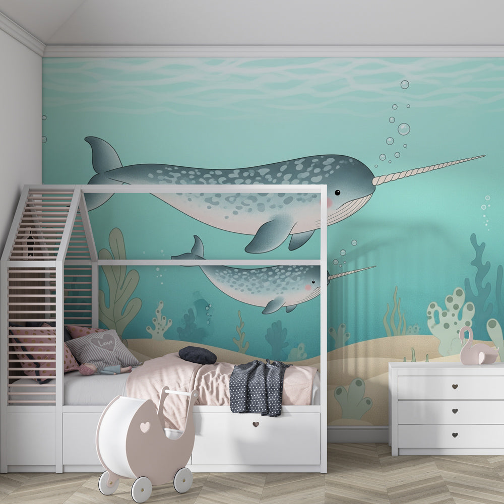 Marine life mural wallpaper with narwhals and coral in children's playroom setting