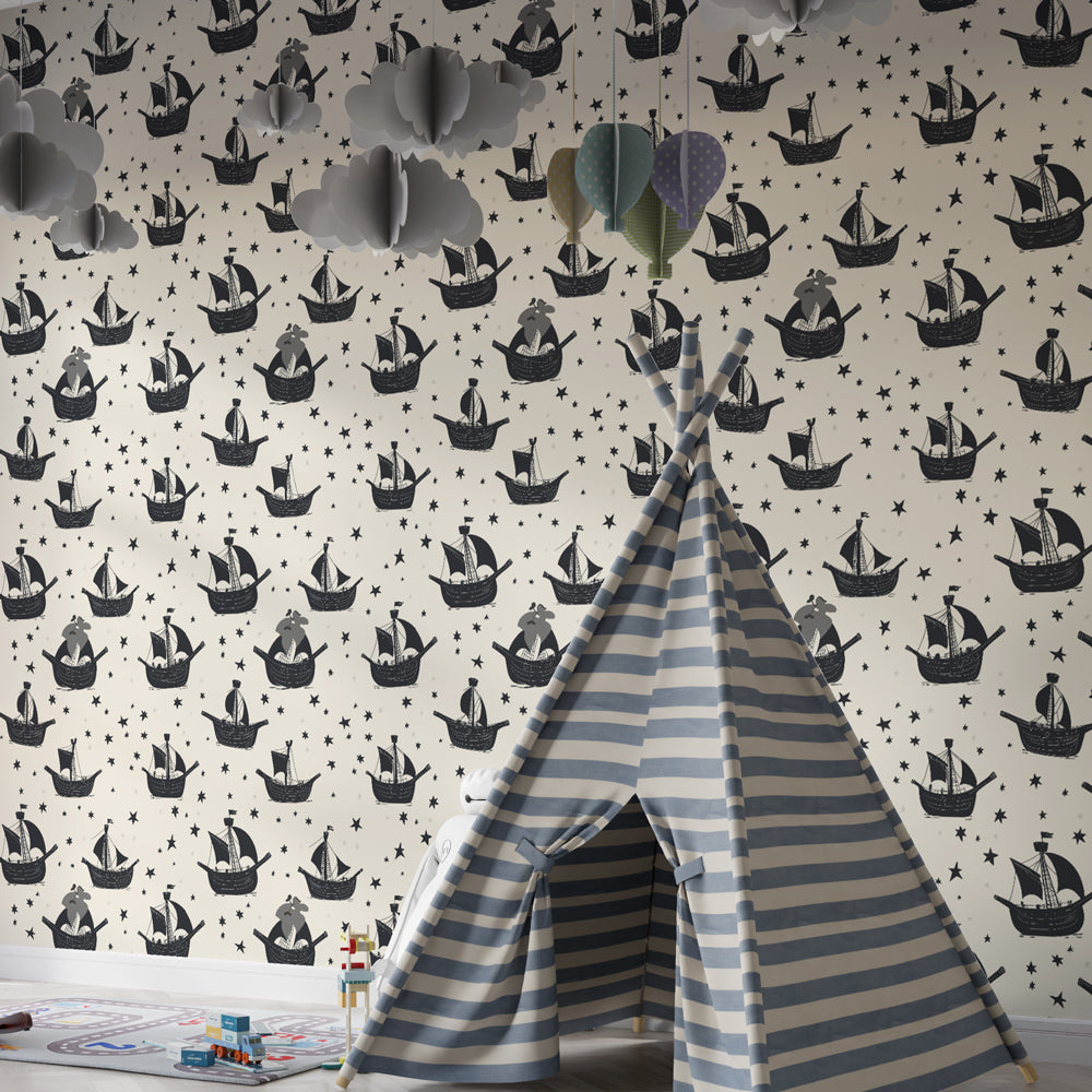 Black and white boat wallpaper with stars decorating stylish children's bedroom interior
