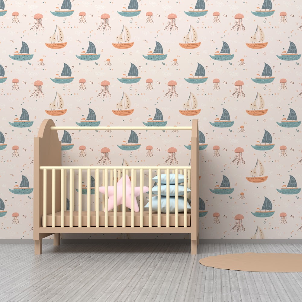 Ocean themed mural wallpaper creating peaceful nursery atmosphere with sailboats and sea creatures