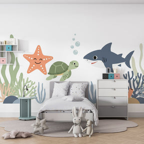 Underwater themed mural wallpaper creating magical marine atmosphere in children's bedroom