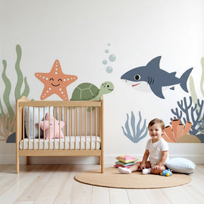 Ocean adventure mural wallpaper with turtle and shark in modern nursery room by Kids-Mundo