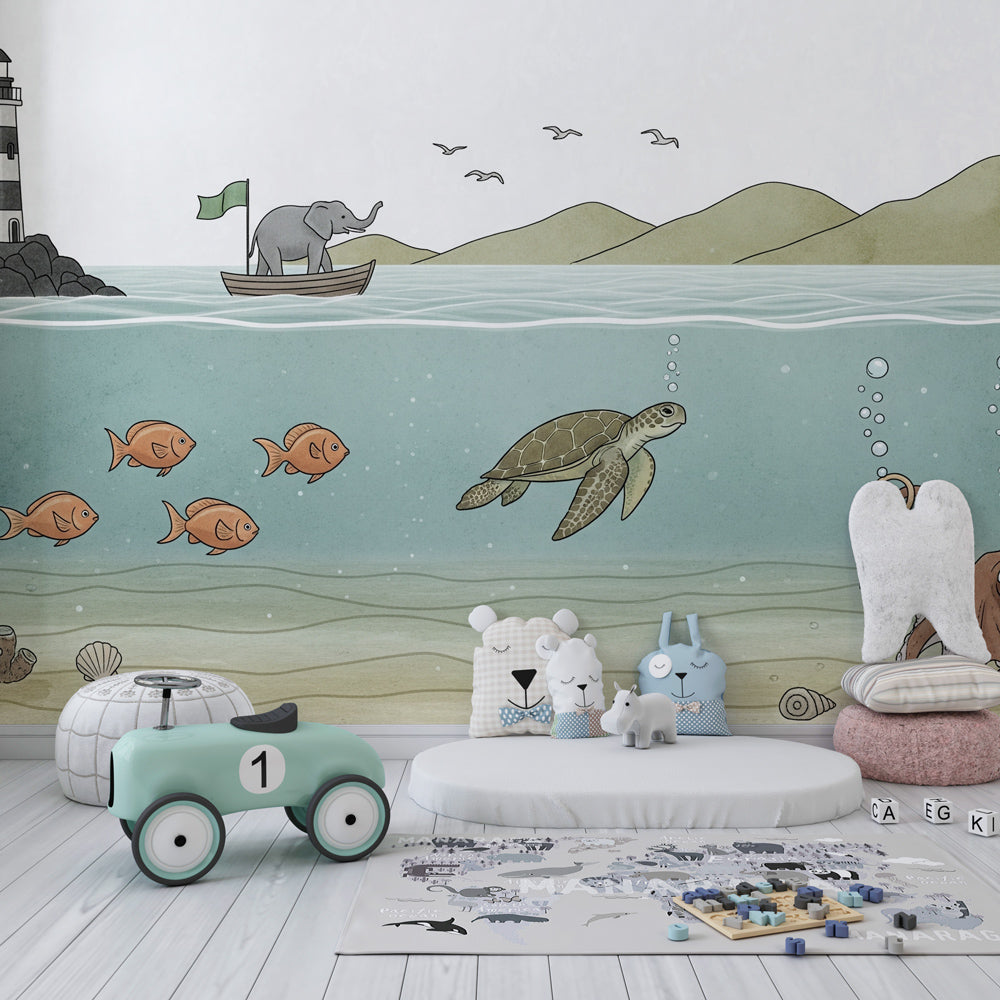 Colorful ocean animal wallpaper featuring elephant and sea creatures in children's playroom