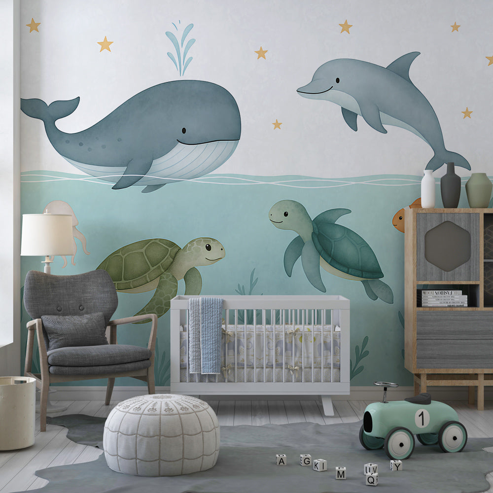 Underwater themed wallpaper with dolphins and jellyfish in children's playroom