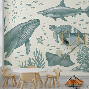Marine life mural wallpaper in children's bedroom featuring sharks, turtles and coral reef design
