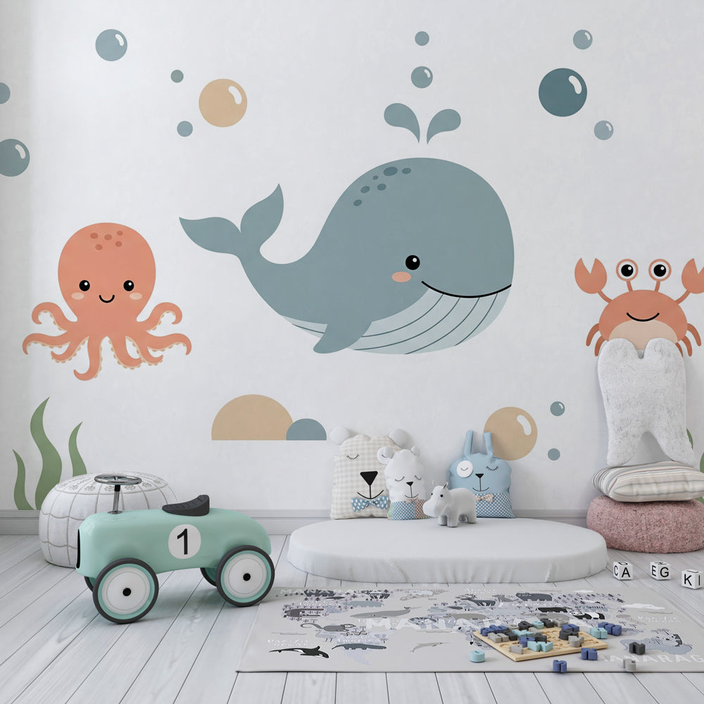 Happy sea creatures wallpaper creating playful underwater theme in children's bedroom