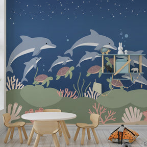 Marine life wallpaper featuring coral and sea creatures in colorful children's playroom
