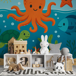 Colorful ocean wallpaper with sea creatures decorating children's playroom space