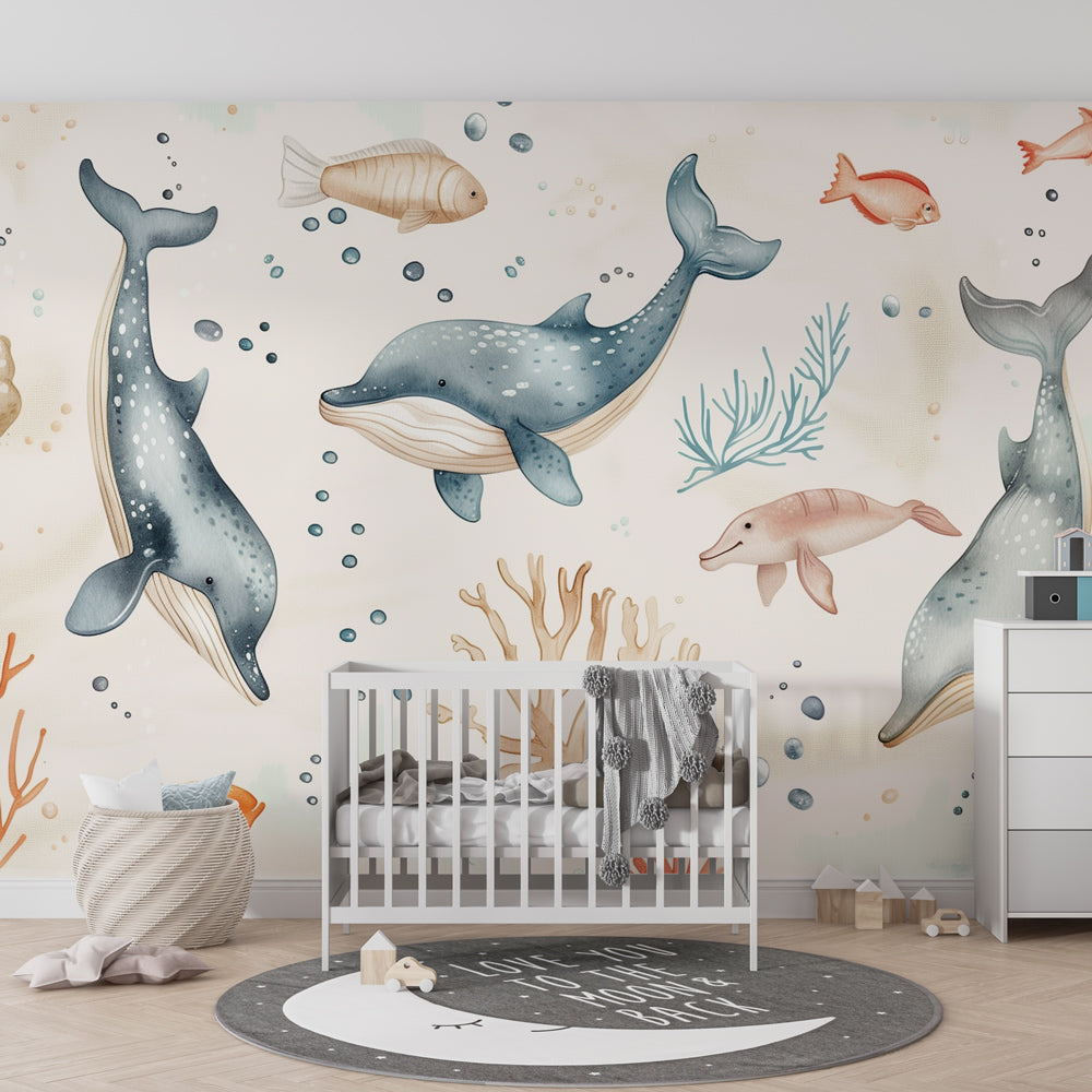 Marine life wallpaper featuring whales and dolphins in children's playroom setting