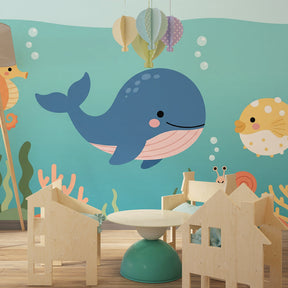 Sea life mural wallpaper with colorful coral and fish creating playful ocean atmosphere in kids room