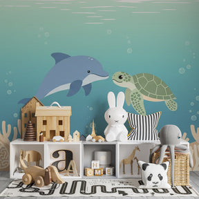 Underwater adventure mural wallpaper featuring dolphins and turtles in modern children's bedroom by Kids-Mundo