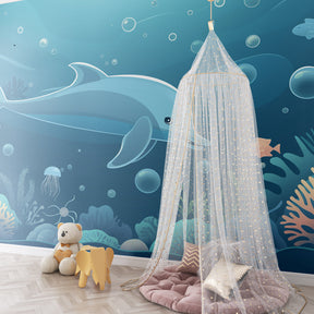 Underwater themed dolphin wallpaper creating serene nursery decor with coral reef design
