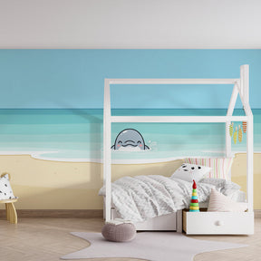 Marine dolphin mural wallpaper transforming children's playroom into ocean sanctuary