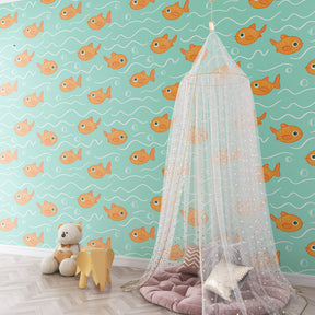 Colorful fish swimming wallpaper transforming children's bedroom into ocean adventure