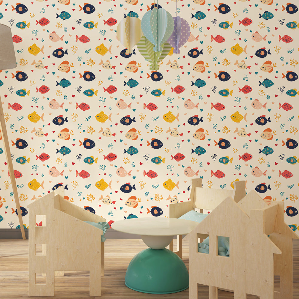 Colorful fish mural wallpaper creating educational underwater theme in children's playroom