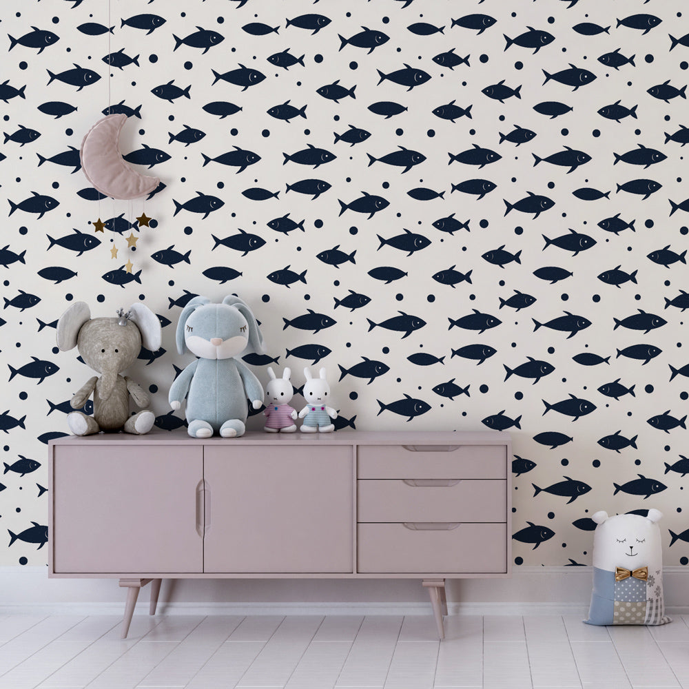 Underwater themed mural wallpaper creating aquatic playroom atmosphere with swimming fish designs