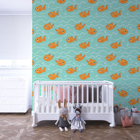 Marine themed mural wallpaper for kids playroom featuring orange fish and blue waves