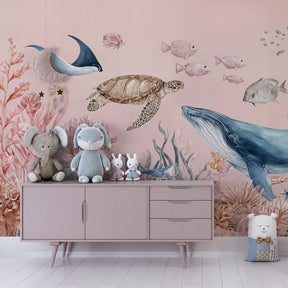Ocean themed mural wallpaper creating underwater paradise in children's bedroom decor