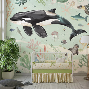 Enchanted ocean wallpaper creating serene underwater themed nursery with green tones