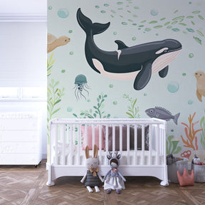 Enchanted ocean wallpaper creating peaceful nursery atmosphere with marine life theme