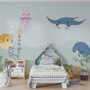 Joyful ocean wallpaper with whales and jellyfish in bright kids playroom setting