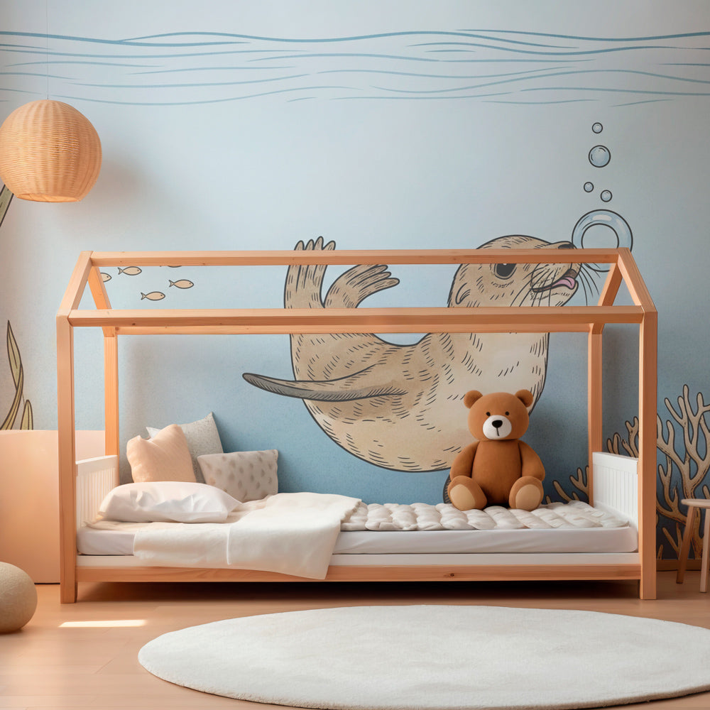 Marine adventure mural wallpaper with playful otter in modern kids bedroom setting