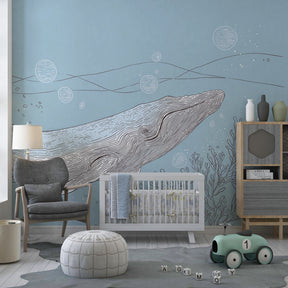 Educational whale mural wallpaper for kids playroom with calming blue ocean theme