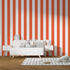 Bold orange stripe wallpaper creating vibrant children's bedroom decor