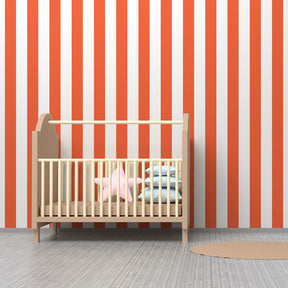 Contemporary orange and white striped wallpaper in bright kids playroom setting