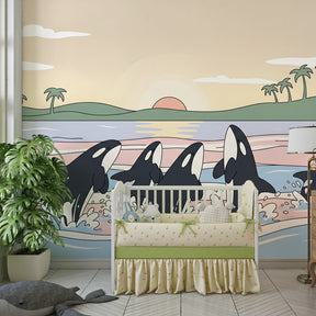 Ocean themed mural wallpaper with orcas and palm trees in children's room setting