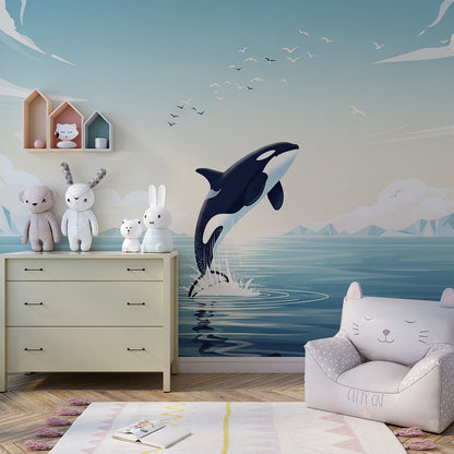 Kids-Mundo leaping orca mural brightening a playroom wall with icy mountain peaks