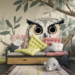 Nature-themed owl wallpaper in modern children's bedroom with natural wood furniture