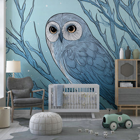 Owl branch mural wallpaper creating calming atmosphere in children's bedroom with natural decor