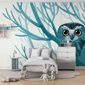 Nature-themed owl mural wallpaper installed in bright kids playroom with natural lighting