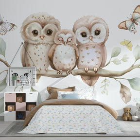 Owl and butterfly wallpaper creating magical woodland nursery decor with natural brown tones