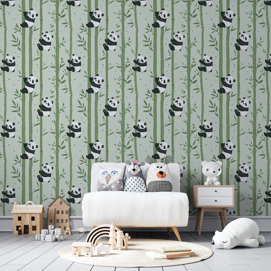 Kids-Mundo panda bamboo pattern wall mural behind a single bed in a modern kids' bedroom with green cushions.