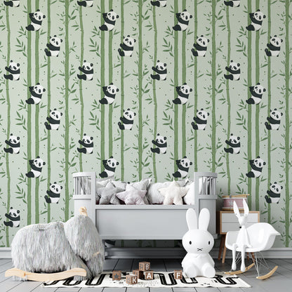 Kids-Mundo panda and bamboo pattern wall mural in a bright playroom with toy storage and a cosy reading nook.