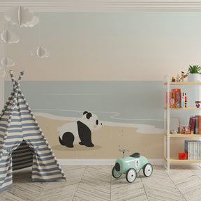Curious panda beach wallpaper creating coastal adventure theme in children's bedroom