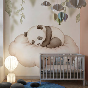 Adorable sleeping panda mural wallpaper in cozy nursery setting with pastel accessories
