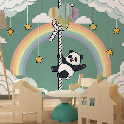 Kids-Mundo panda and rainbow wall mural styled in a bright green nursery room