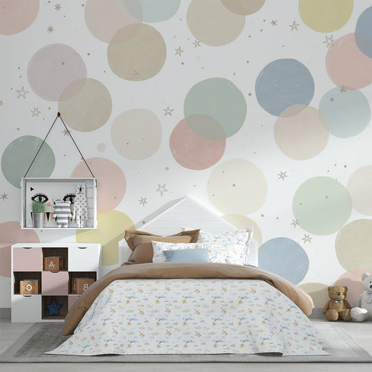 Kids-Mundo pastel circle pattern mural covering a feature wall in a gender-neutral kids' bedroom