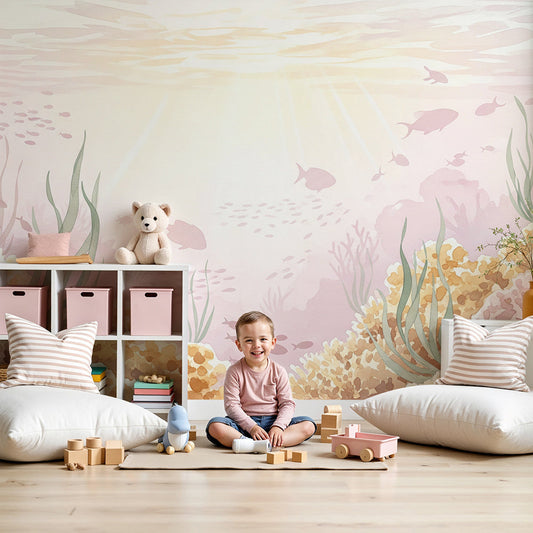 Kids-Mundo pastel coral reef wall mural styled in a calm baby nursery with soft pink and gold tones