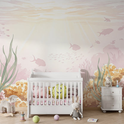 Kids-Mundo coral reef wall mural covering a playroom wall with sunbeams and tiny fish