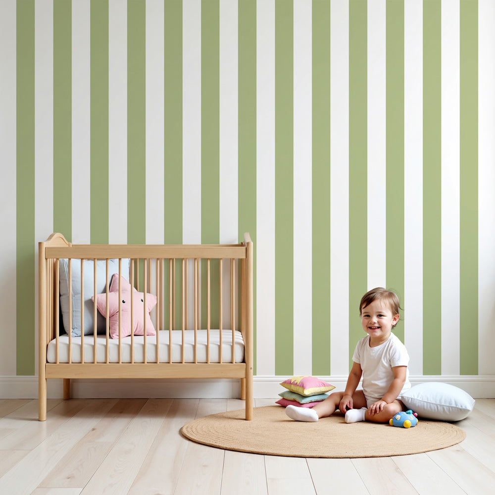Kids-Mundo pastel green stripe wall mural in a bright nursery with a white cot and soft toys nearby.