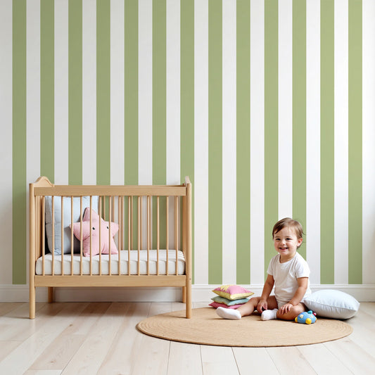 Kids-Mundo pastel green stripe wall mural in a bright nursery with a white cot and soft toys nearby.